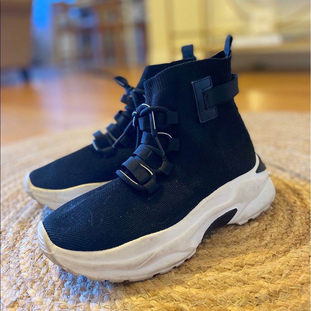 Black and white slip on bootie sneakers